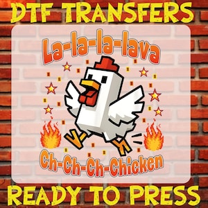 May include: DTF Transfers design featuring a pixelated white chicken with red accents, running with flames and stars. The text "La-la-la-lava" and "Ch-Ch-Ch-Chicken" are in orange, with "READY TO PRESS" at the bottom.