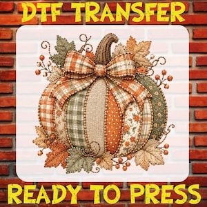 May include: A DTF transfer ready to press featuring a decorative pumpkin with a plaid bow. The pumpkin is composed of vertical segments in orange, green, and cream with various patterns including gingham, polka dots, and floral prints.