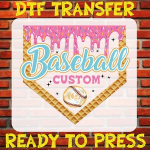May include: A pink and blue baseball-themed iron-on transfer design with a waffle pattern, dripping pink icing, sprinkles, and a baseball. The text reads "Baseball Custom" and "Ready to Press".