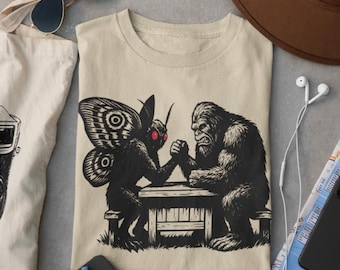 Bigfoot v Mothman Shirt Funny Cryptid Arm Wrestling T-Shirt men's Graphic Tee dad tshirt Creature Gift for camping teenager comic con hunter