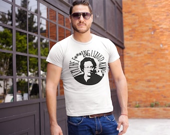 May include: White t-shirt with a black and white graphic print of a man wearing glasses and the text "I'm the f***ing Lizard King".