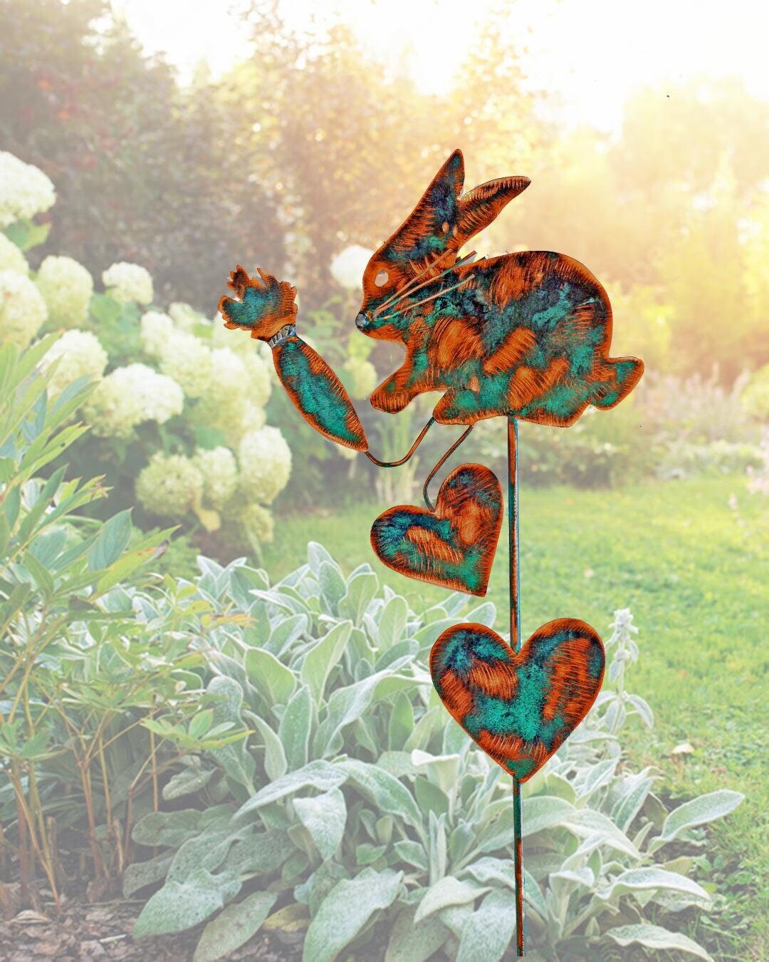 A Metal Copper Rabbit Stake to Place in a Planter or Garden, a