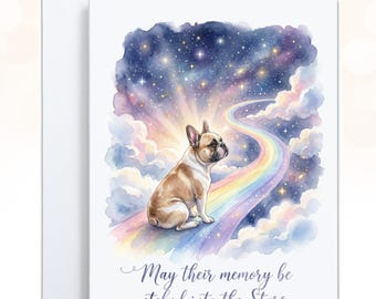 May include: A greeting card featuring a watercolor illustration of a fawn and white French Bulldog sitting on a rainbow bridge leading into a starry night sky with clouds. The text below reads, May their memory be etched into the Stars.