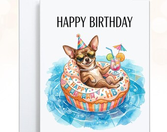 May include: A white greeting card featuring a watercolor illustration of a brown chihuahua wearing a colorful party hat and sunglasses, lounging in a cupcake-shaped pool float with a cocktail, with the text HAPPY BIRTHDAY printed above.