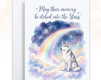 May include: A white greeting card featuring a watercolor illustration of a grey and white husky sitting on pastel clouds. A vibrant rainbow arches over the dog against a dark blue starry night sky. The text reads, May their memory be etched into the Stars.