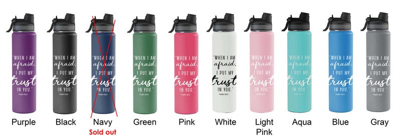 May include: A range of insulated water bottles in colours such as purple, black, green, pink, white, light pink, aqua, blue, and grey. Each bottle has a black lid and the text "WHEN I AM afraid I PUT MY trust IN YOU" in white.