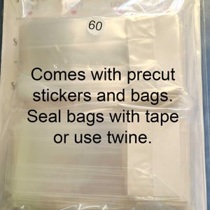 May include: A clear plastic bag filled with 60 smaller clear plastic bags. The bags are labeled with the text "Comes with precut stickers and bags. Seal bags with tape or use twine."