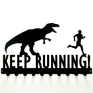 Keep Running T-Rex & Man Medals Rack image 1