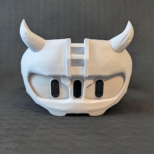 Front view of the upper Cyber Oni headplate in all white over the Meta Quest 3 headset with an elite strap.