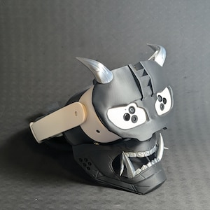 Side view of the full Cyber Oni mask set in black and silver over the Meta Quest 3s headset with an elite strap.