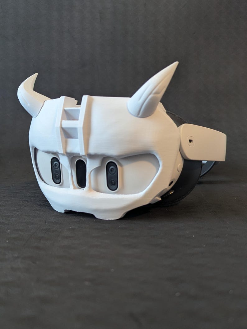 Side view of the upper Cyber Oni headplate in all white over the Meta Quest 3 headset with an elite strap