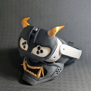 Side view of the full Cyber Oni mask set in black and gold over the Meta Quest 3s headset with an elite strap.