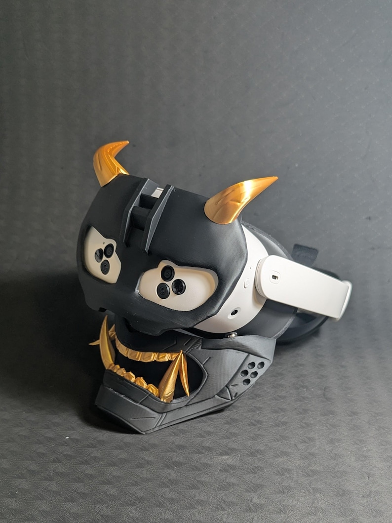 Side view of the full Cyber Oni mask set in black and gold over the Meta Quest 3s headset with an elite strap.