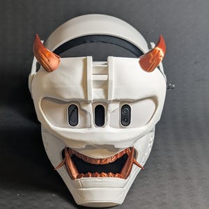 Front view of the full Cyber Oni mask set in white and copper over the Meta Quest 3 headset with a halo strap.