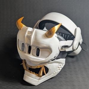 Side view of the full Cyber Oni mask set in white and gold over the Meta Quest 3 headset with a halo strap.