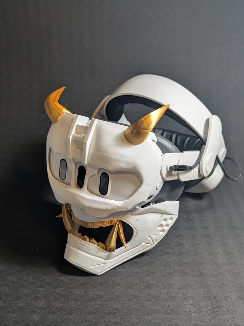 Side view of the full Cyber Oni mask set in white and gold over the Meta Quest 3 headset with a halo strap.