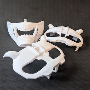 A collection of the different components making up the Cyber Oni mask set for the Quest 3 and Quest 3s