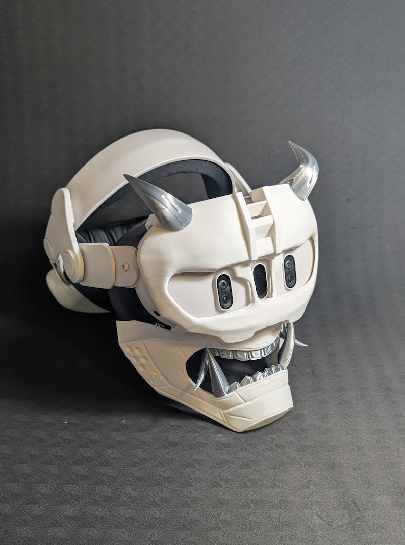 Side view of the full Cyber Oni mask set in white and silver over the Meta Quest 3 headset with a halo strap.