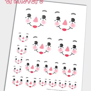 May include: A sheet of iron-on doll face transfers. The sheet features multiple sizes of doll faces with different expressions, including smiling, winking, and surprised. The faces are in various shades of pink, red, and black.