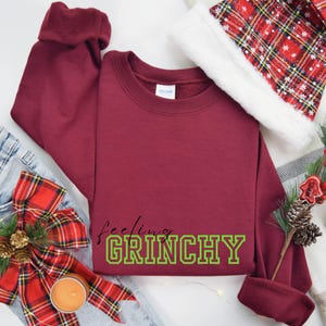 Grinch Christmas Sweatshirt, Festive Holiday Pullover Inspired by the Grinch, Perfect for Christmas Cheer and Fun