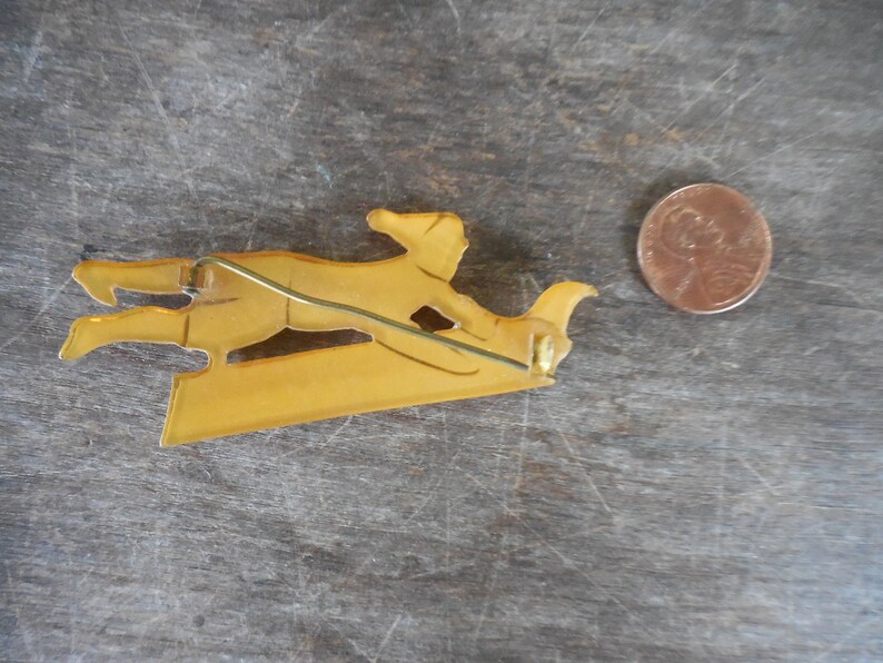 Vintage Unsigned Laminated Celluloid Pin Brooch Sled Sledding Toboggan