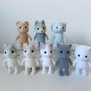 Sylvanian families/Calico Critters sisters brothers New out of box spare figurine: Replacement naked miniature doll curly ear cat elephant