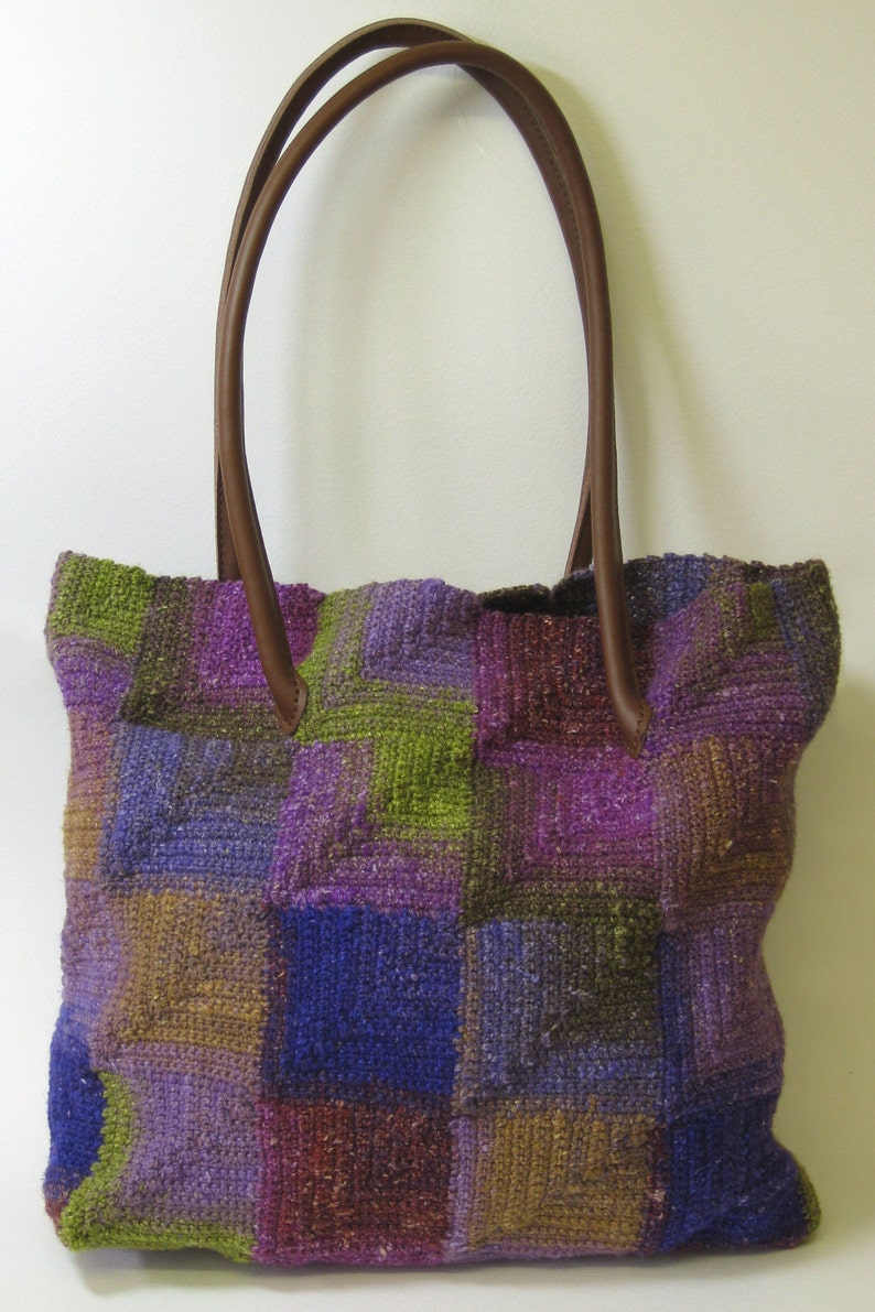 designer purse with squares on it