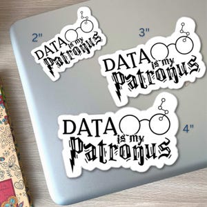 May include: Three white stickers with the text "DATA is my Patronus" in a stylized font. The stickers are 5, 7.6, and 10.2 cm in size and feature a pair of glasses and a molecular structure graphic.