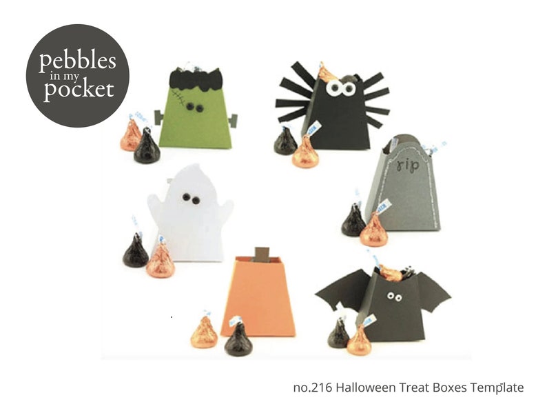 Puede incluir: Un conjunto de seis cajas de golosinas de Halloween, cada una con un personaje diferente: Frankenstein, ara&ntilde;a, fantasma, calabaza, murci&eacute;lago y una l&aacute;pida. Las cajas est&aacute;n hechas de papel y est&aacute;n decoradas con varios colores y detalles. Las cajas est&aacute;n llenas de caramelos de chocolate.