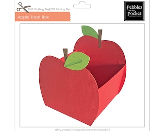 Könnte beinhalten: Rote apfelartige Geschenkbox mit einem grünen Blatt oben. Die Box ist aus Papier und hat einen quadratischen Boden. Der Text "Apple Treat Box" ist auf der Vorderseite der Box aufgedruckt.
