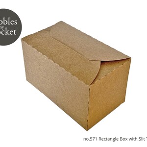 May include: A brown cardboard rectangle box with a slit opening on the top. The box is labeled "no. 571 Rectangle Box with Slit Template".