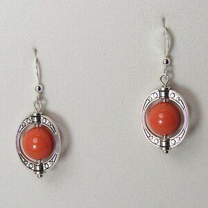 Coral Colored Bead Framed Earrings  SKU: ER1037