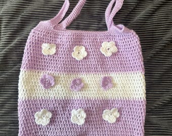 Crocheted lilac and white tote bag with flower decorations