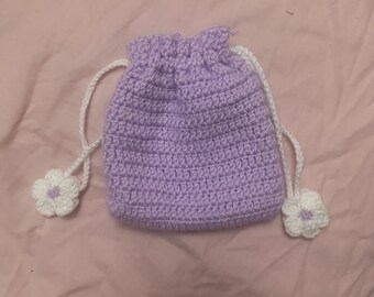 Crochet lilac pouch with flower detail