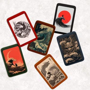 May include: A collection of five rectangular rolling trays featuring diverse artistic designs including koi fish, a dragon, a samurai silhouette against a red sun, and a demon mask, each framed by a solid colored border in red, brown, green, or black.