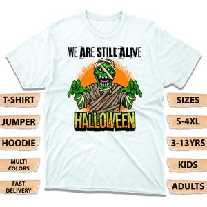 Funny We Are Still Alive Mummy Zombie Halloween T-Shirt, Spooky Undead Costume Tee, Trick-or-Treat & Scary Party Fans Shirt