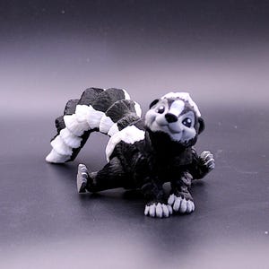 Articulated 3D Printed Skunk Figurine: Poseable Desk Toy