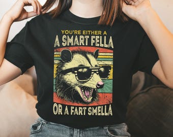 You're Either A Smart Fella Or A Fart Smella Shirt, Funny Raccoon Bike Humor Smart Fella or Fart Smella T-Shirt, Funny Sarcastic Racoon Tee