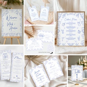 May include: A collection of wedding stationery with a blue and white floral design. Items include a welcome sign, tags, a cocktail menu, RSVP cards, menus, and invitations. The welcome sign reads "Welcome Mark + Amelia".