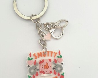 Smutty Book Club Keychain – Spicy Romance Reader Accessory with Handcuff Charm