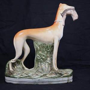 Victorian Staffordshire Pottery Greyhound Figurine with Hare in its Mouth.