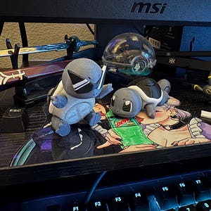 Atriculated Dark Squirtle Fidget Spinner/Figure