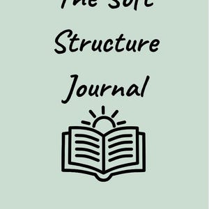 Könnte beinhalten: Ein Journal-Cover mit dem Titel "The Soft Structure Journal" in schwarzer Schrift. Darunter eine Illustration eines offenen Buches mit einem Sonnenaufgang. Der Name des Autors, "By: Elodie Storelli", steht unten.