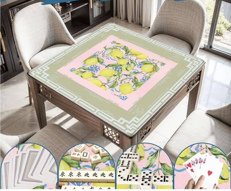 May include: A wooden game table with a decorative top featuring a lemon and floral design. The table is surrounded by four chairs. The table is designed for playing games like Mahjong, dominoes, and cards.