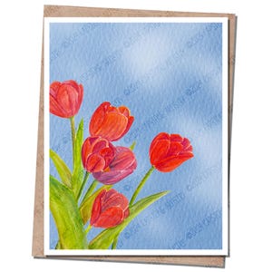 May include: A greeting card featuring a watercolor painting of red tulips with green stems and leaves against a light blue background. The card is set in a brown paper frame. The text "©2024 CAPSTONE ARTISTRY" is visible.