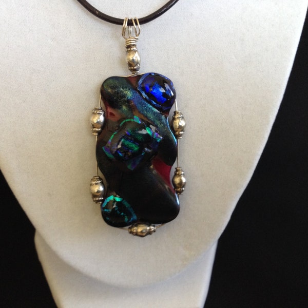 Large fused glass pendant style necklace, sterling silver wire wrap with silver bali beads on on leather neck cable.