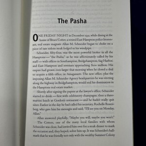 May include: A page from a book titled "The Pasha" with a black and white image of a man in a suit. The text describes a real estate broker in the Hamptons who is known as "The Pasha".