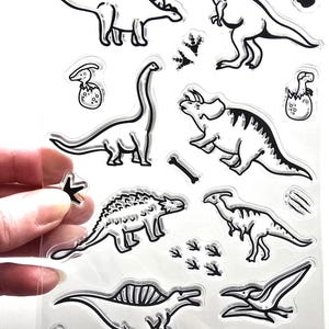 Tampons transparents DINOSAURES MIGNONS oeuf de bébé coquille d'oeuf patte empreinte de patte os estampage en caoutchouc fabrication de cartes scrapbooking animaux préhistoriques