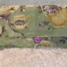 Tea Wallet Cozy in Green Background with Mixed Tea Pots, Cups, Saucers, Etc.