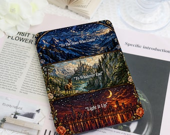 May include: A rectangular e-reader case featuring a stained-glass style design divided into three horizontal panels. The top panel shows a dark blue mountain landscape with the text "To The Stars Who Listen". The middle panel depicts a castle, forest, and deer with the text "To Whatever End". The bottom panel shows a city skyline at night with the text "Light It Up".